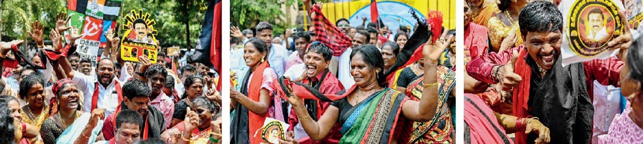 DMK members at the party headquarters in Chennai hold a portrait of M K Stalin as they cheer the release of vote counts. PIC/AFP