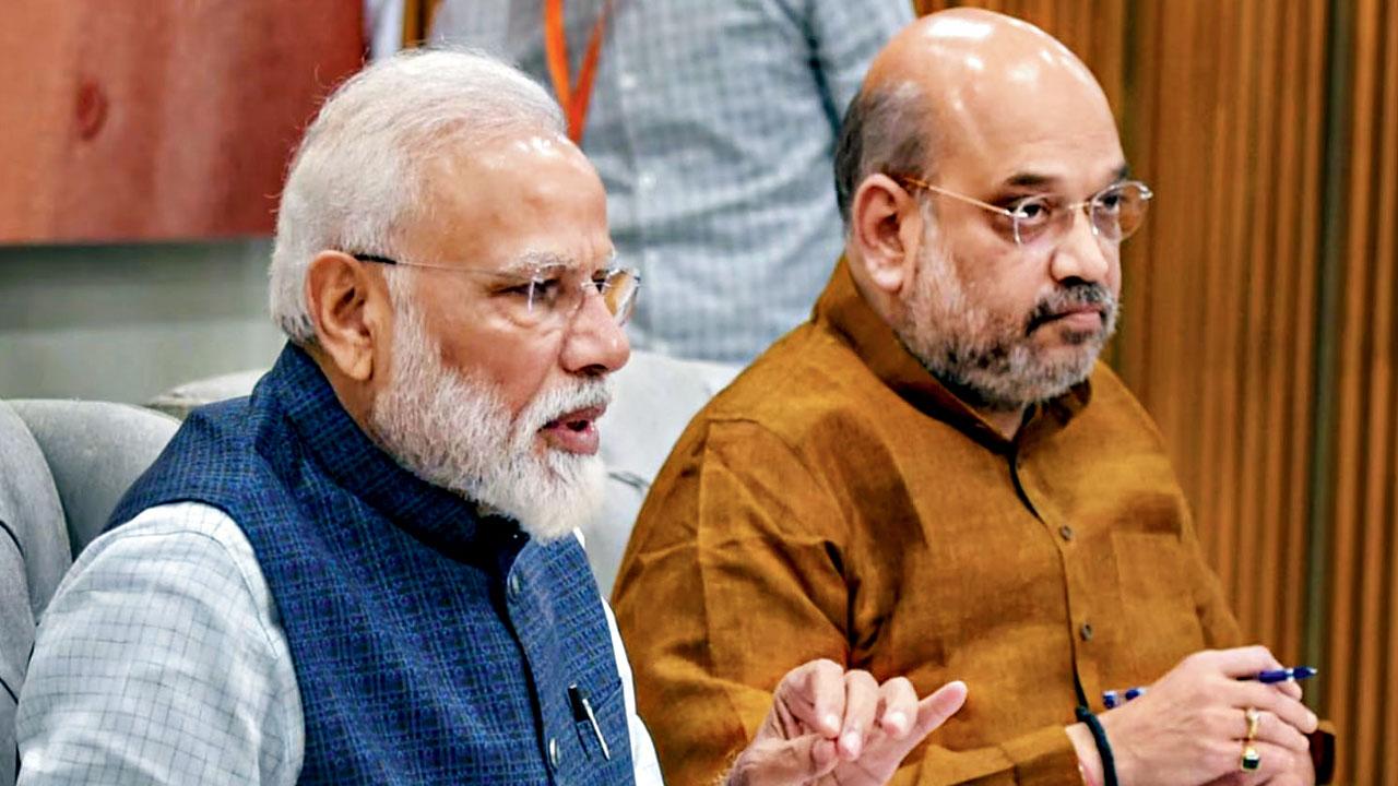PM Modi and Amit Shah at a meeting. File pic