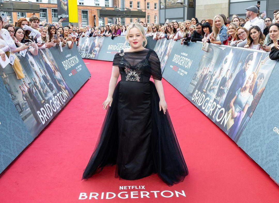 Nicola wore a bespoke Erdem gown dotted with bees, which caused a sensation in Ireland, especially after her friend Erdem embroidered the series mascot onto the bodice and strap of the striking black satin gown, fit for any Regency ballroom.