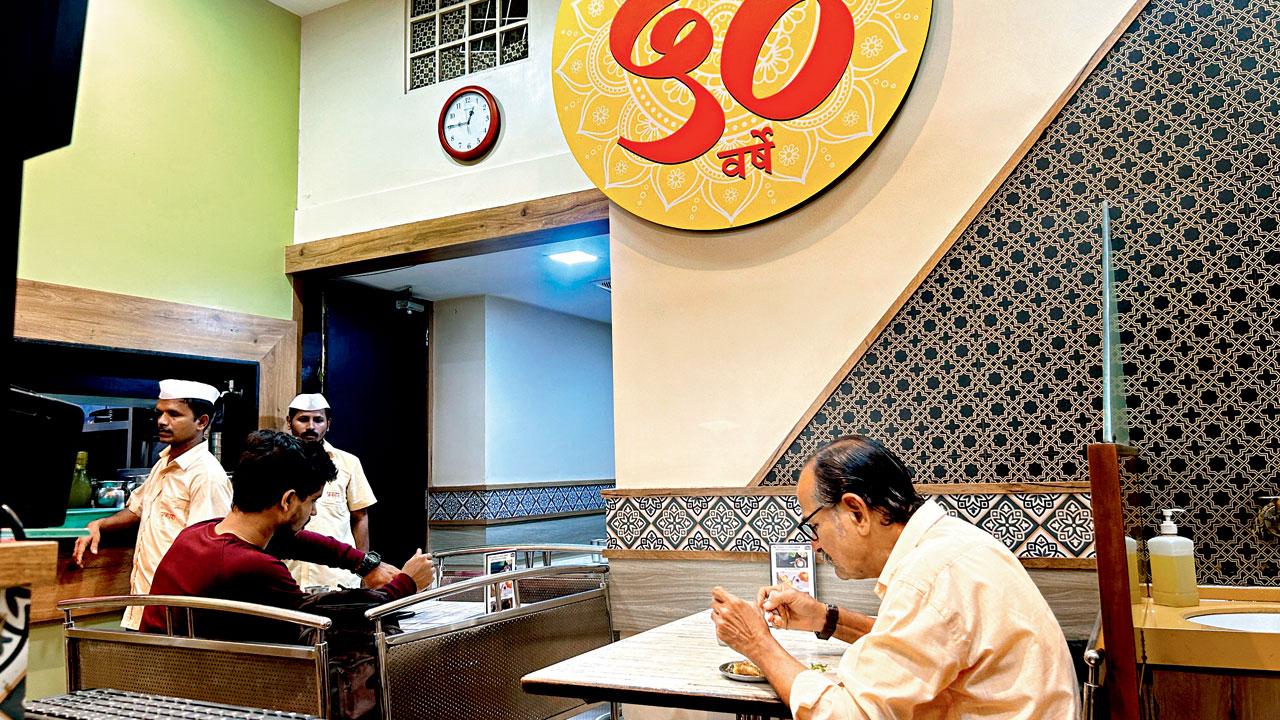 Patrons indulge in their meals at the 50-year-old Maharashtrian eatery in Dadar. Pics/Devanshi Doshi