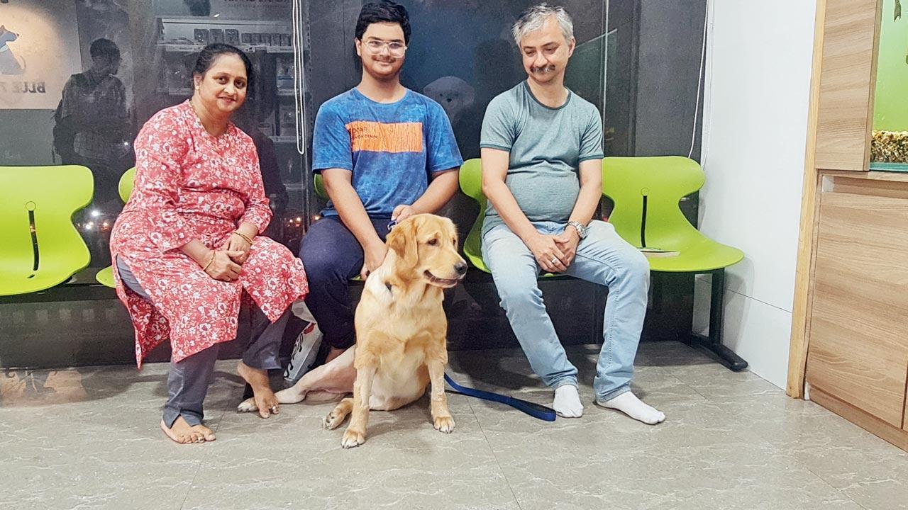 Maple, who was the first dog in India to undergo a total hip replacement, with  her family at Dr Dave’s clinic in Borivli, for a post-operative check-up