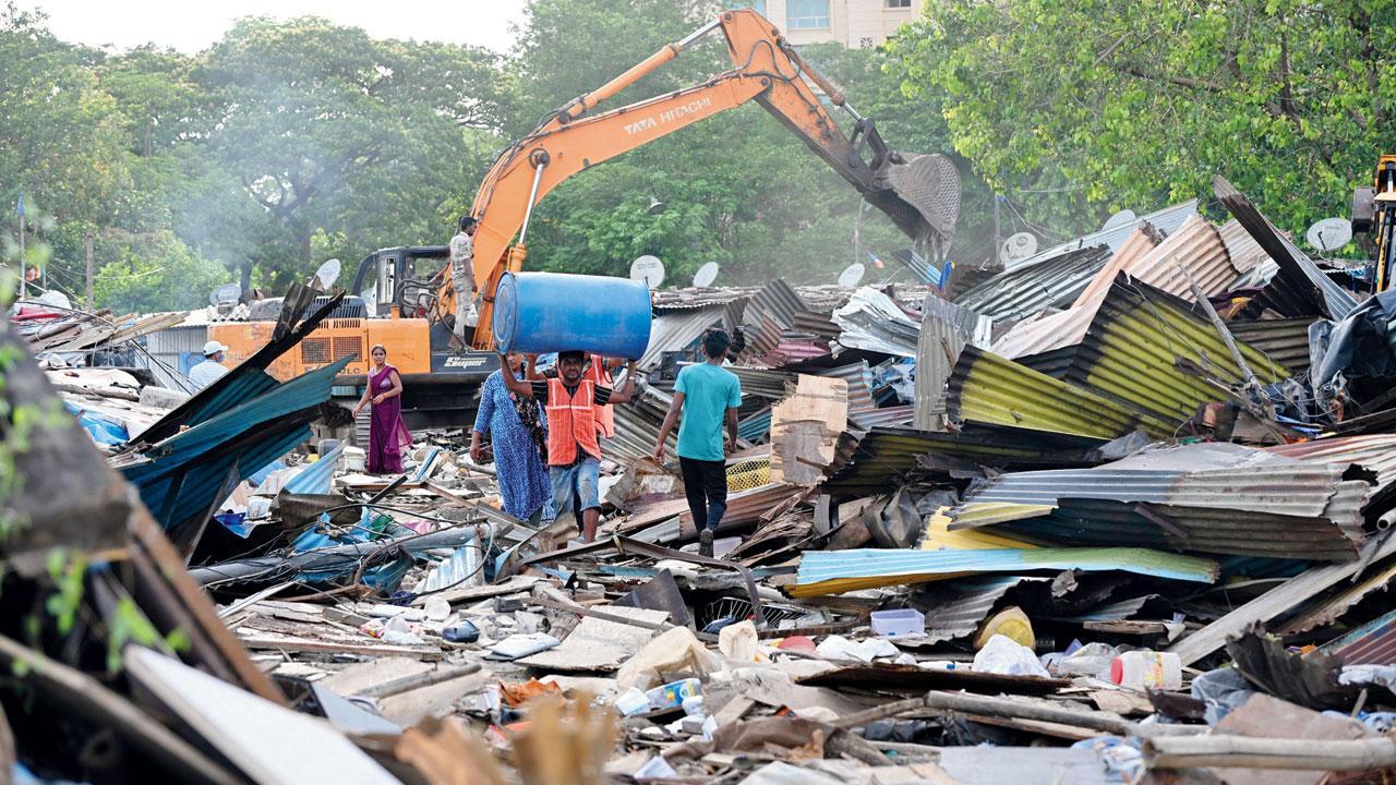 Mumbai: Locals irate after BMC starts razing Powai slum, 15 hurt in stone pelting