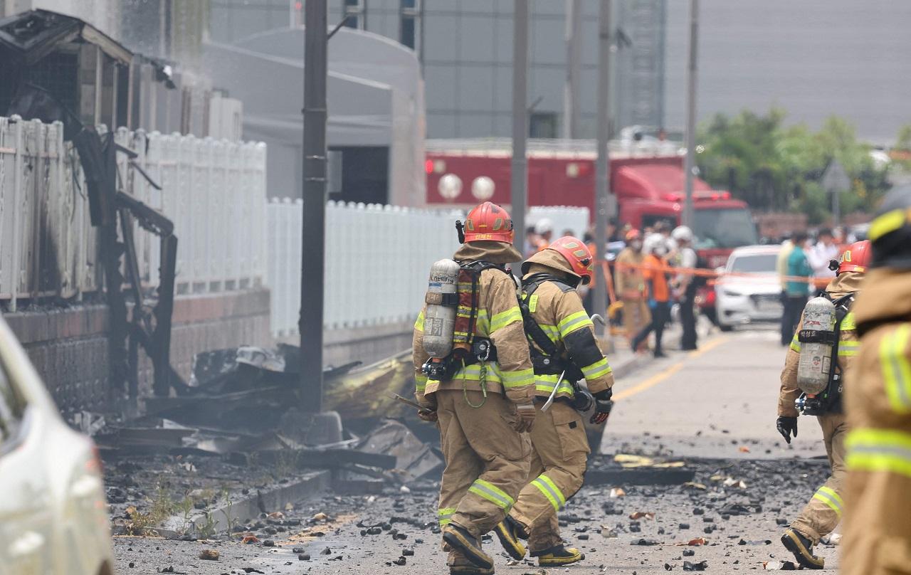 One victim was pronounced dead at a hospital, and fire workers retrieved 21 bodies from the factory one by one later Monday. Eighteen victims were Chinese, two were South Korean and one was Laotian. The nationality of one of the dead was being verified