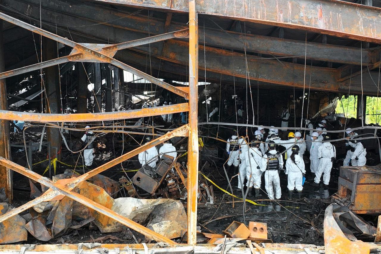 Kim said a separate team of fire, police and other experts were also set to examine the site later Tuesday to investigate what exactly caused the blaze. Labour officials said the government will separately investigate whether any safety issues were involved in the fire. The factory is owned by a battery manufacturer, Aricell