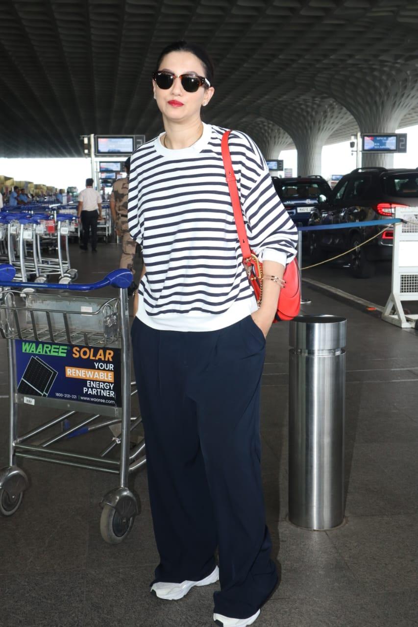 Gauahar Khan opted for comfy T-shirt and loose pants for her airport look
