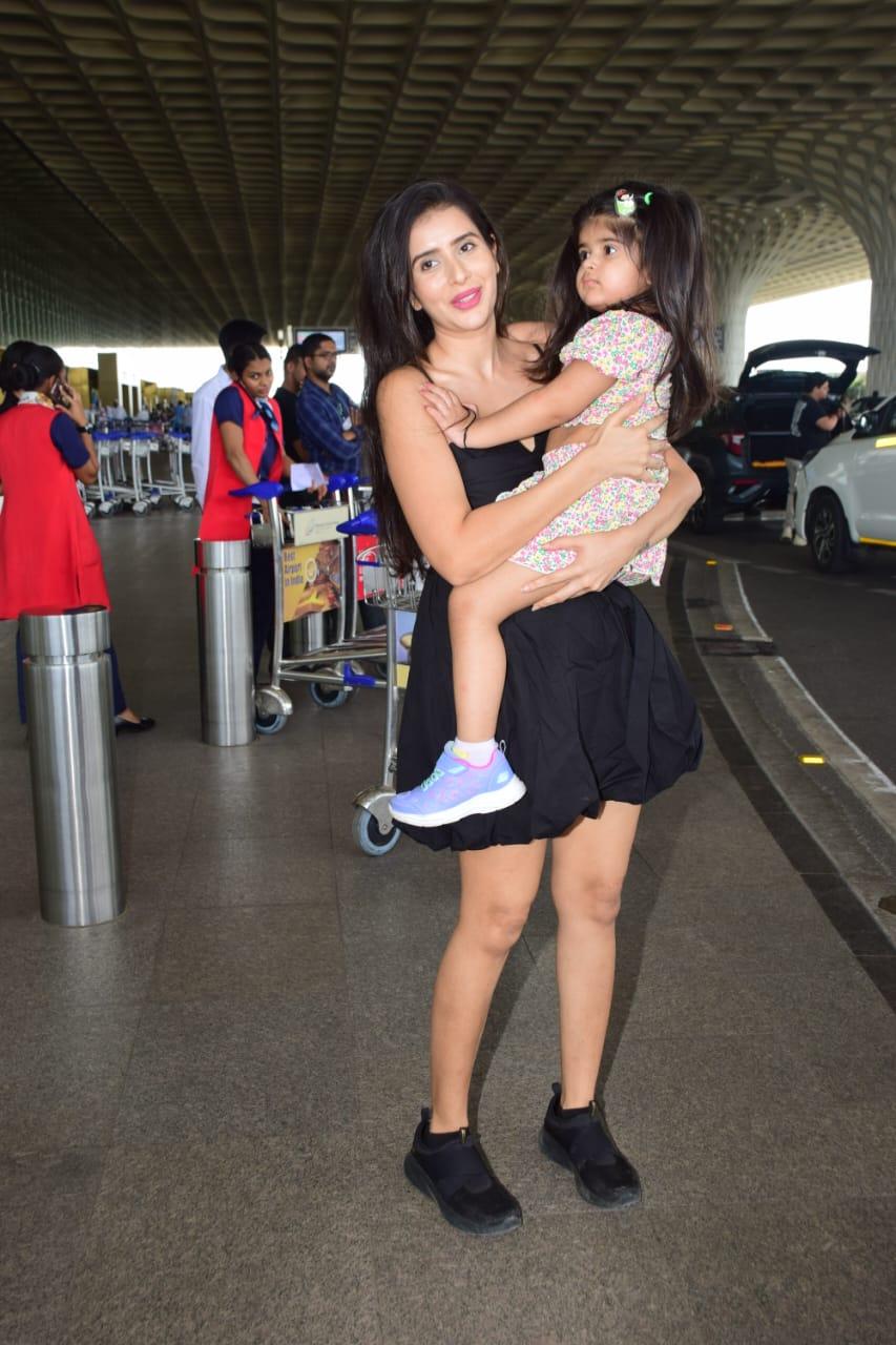 Charu Asopa was clicked at the Mumbai airport with her little princess