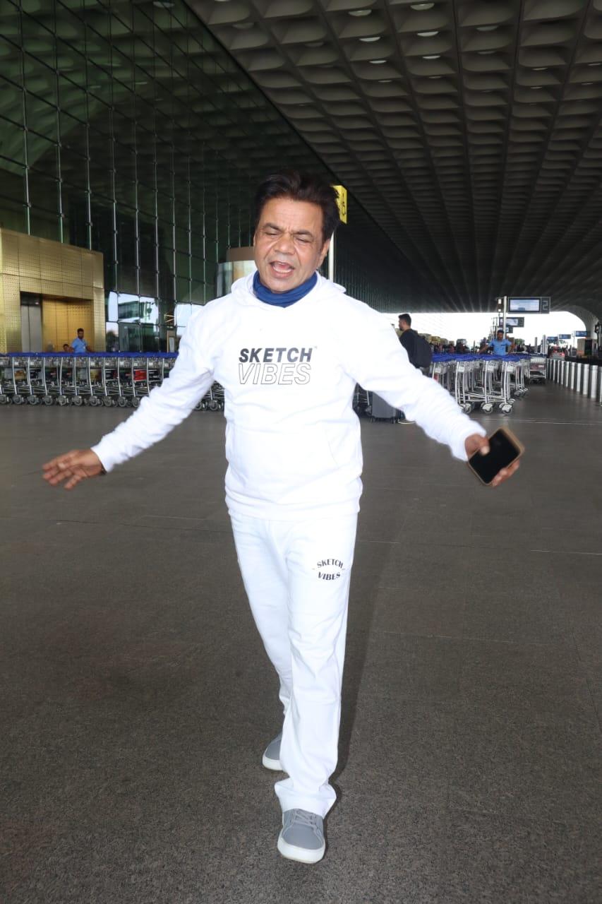 Rajpal Yadav opted for smart and sporty outfit for his airport look