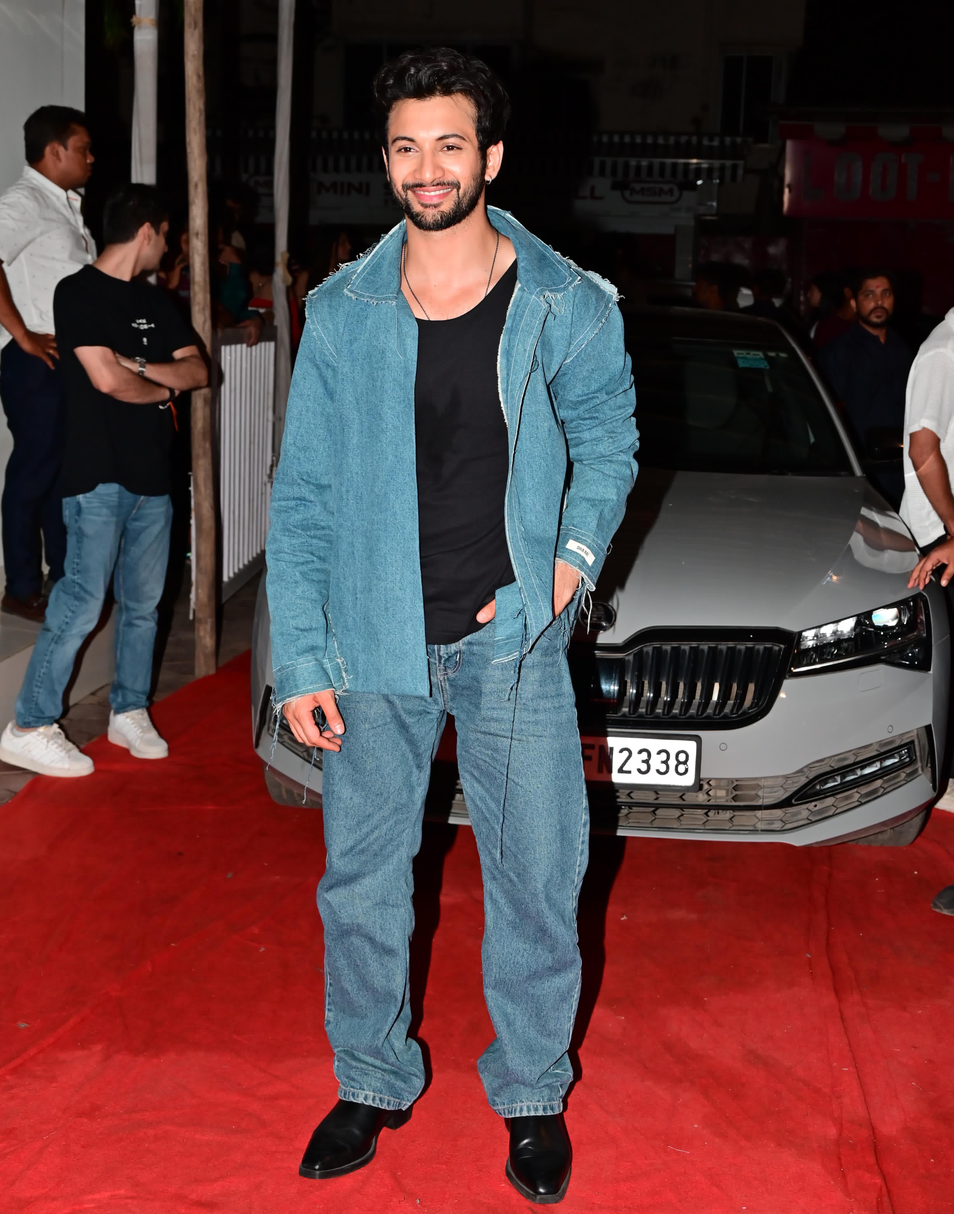 Rohit Saraf opted for black T-shirt and paired it with blue jeans and a denim jacket