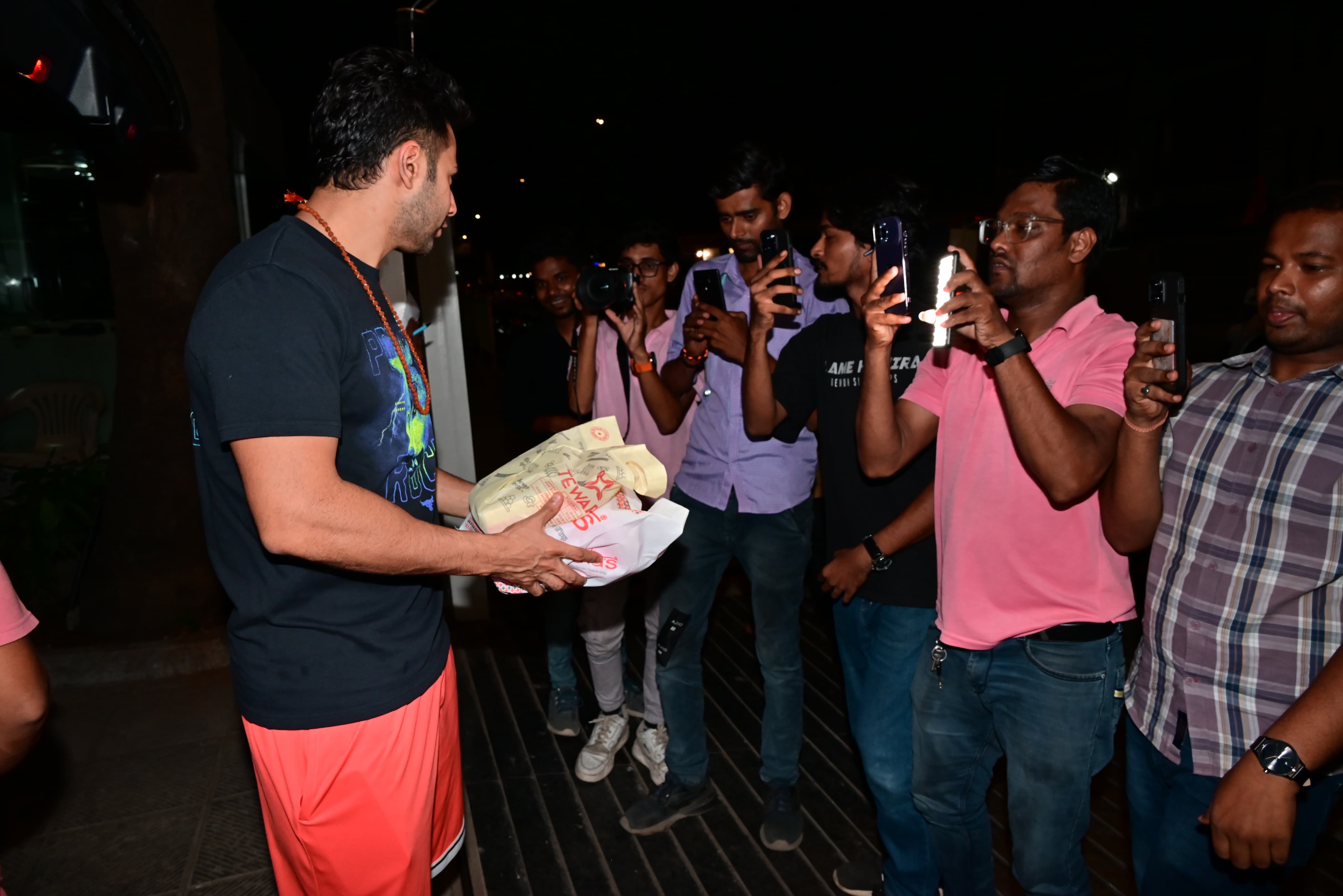 To celebrate his baby girl's arrival Varun distributed sweets to paparazzi