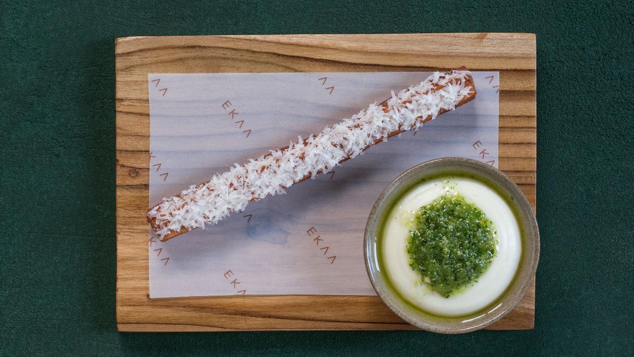 At Ekaa in Mumbai, they serve it with churros. They serve a garlic churro with local cheese and as a decadent dip they have blended potato cheese with a dollop of their house thecha.