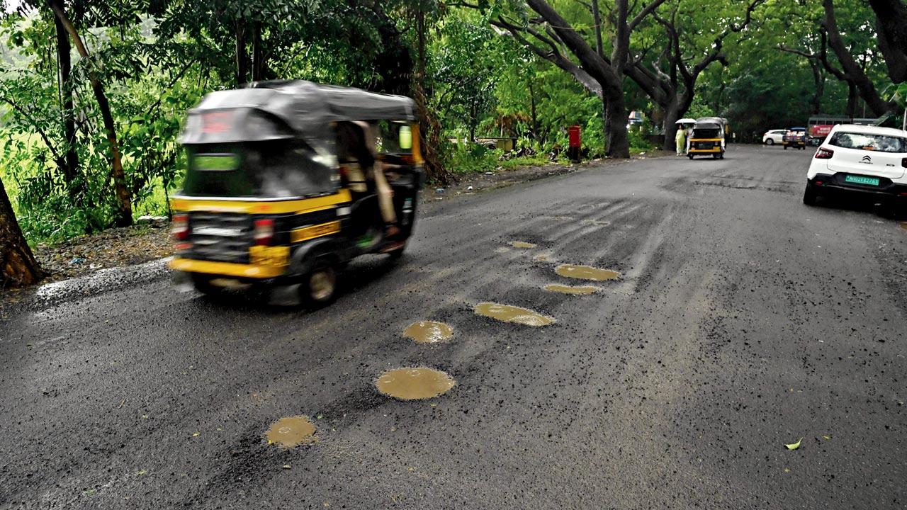 Potholes have developed less than two months since the road was redone