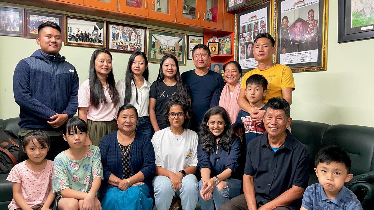 Authors Neha and Diksha Dwivedi with the Kengurüse family in Kohima