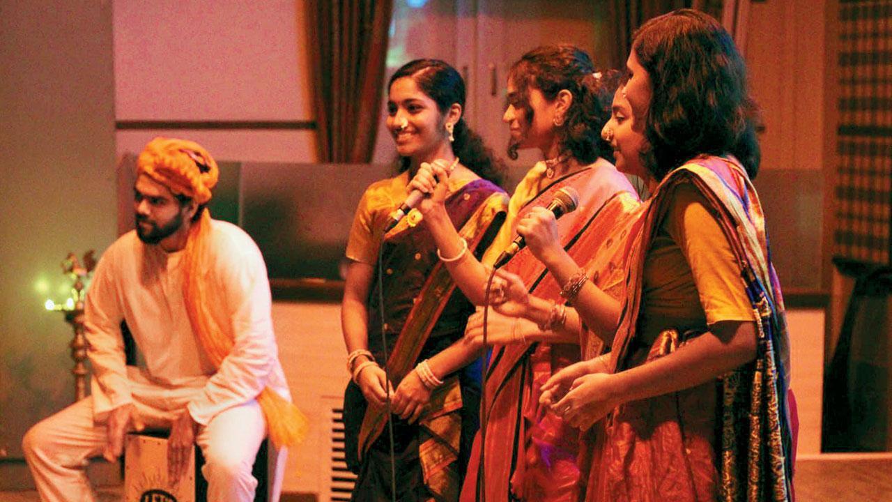 Students perform a traditional  composition at the event
