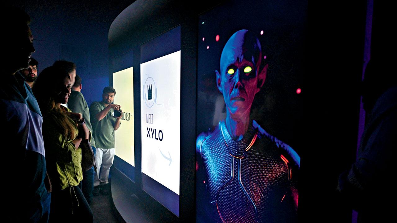 AI alien Xylo helps visitors figure out the tech at Pixelab. Pics/Atul Kamble
