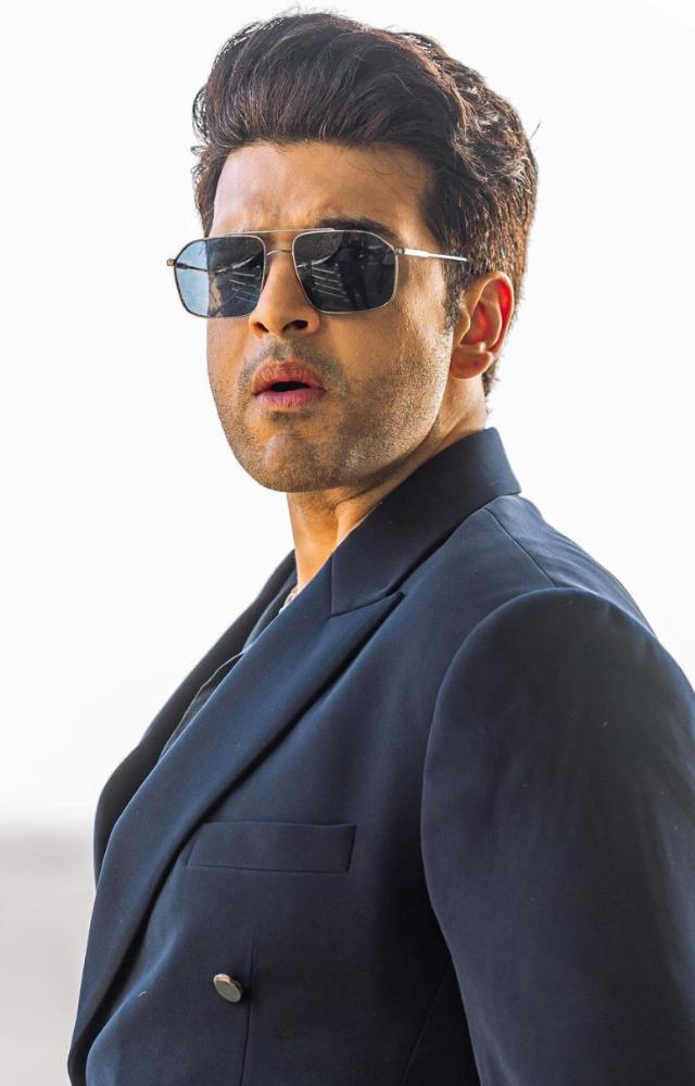 Bollywood actors have often turned heads with their impeccable style, especially when donning classic black suits. 
