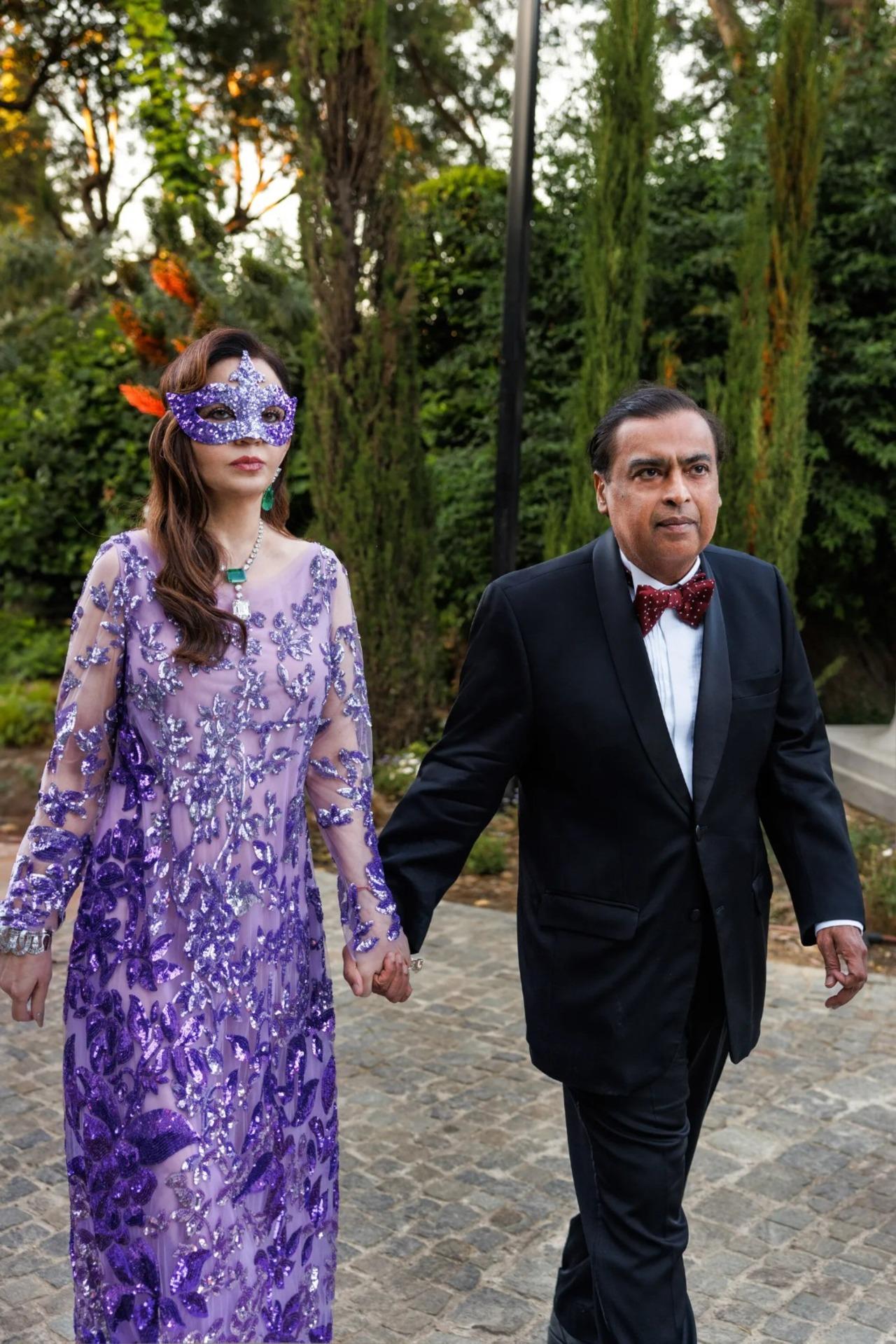 Nita and Mukesh Ambani arriving at the masquerade ball.