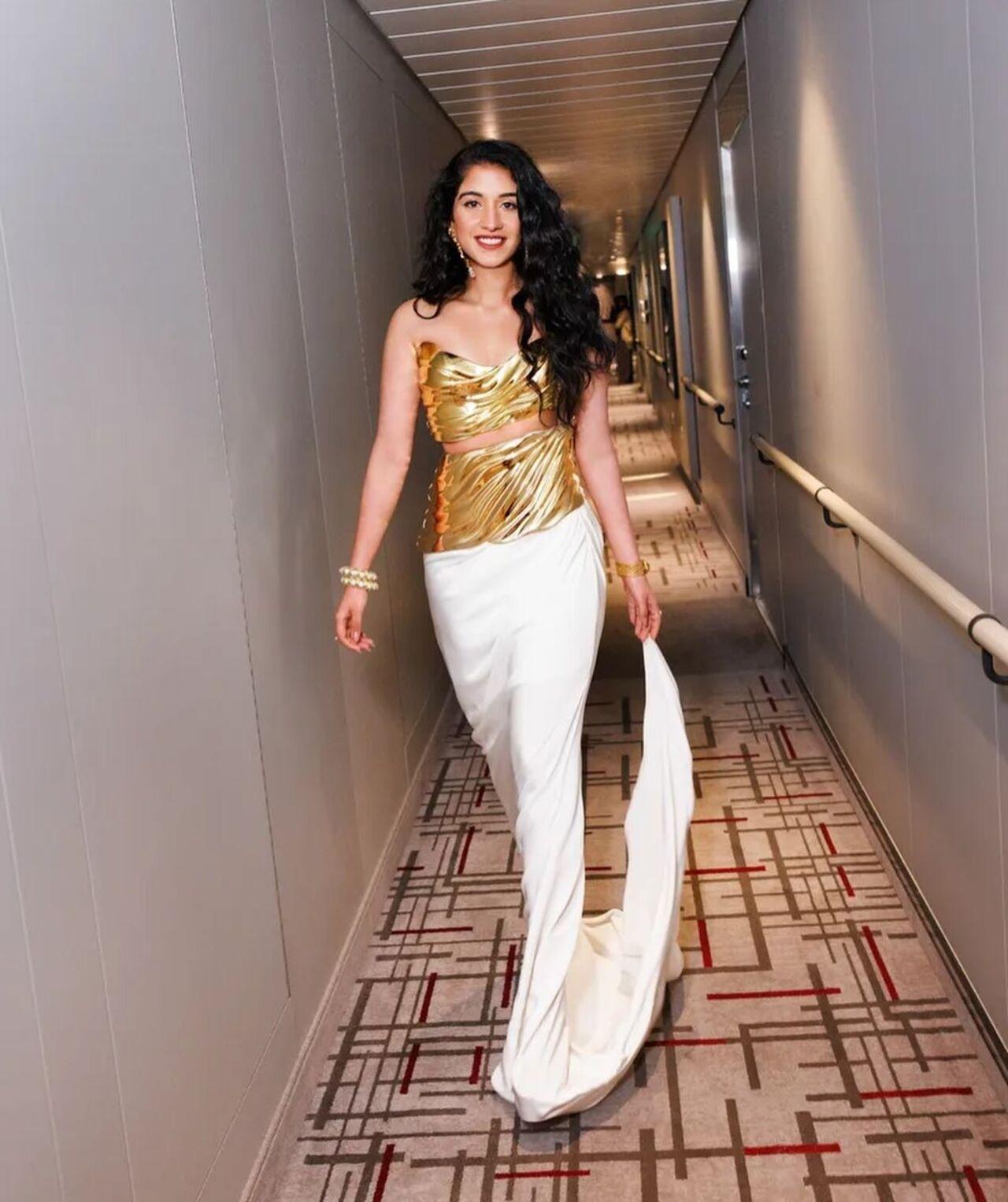 Bride-to-be Radhika Merchant on her way to the second night’s toga party concert wearing Grace Ling