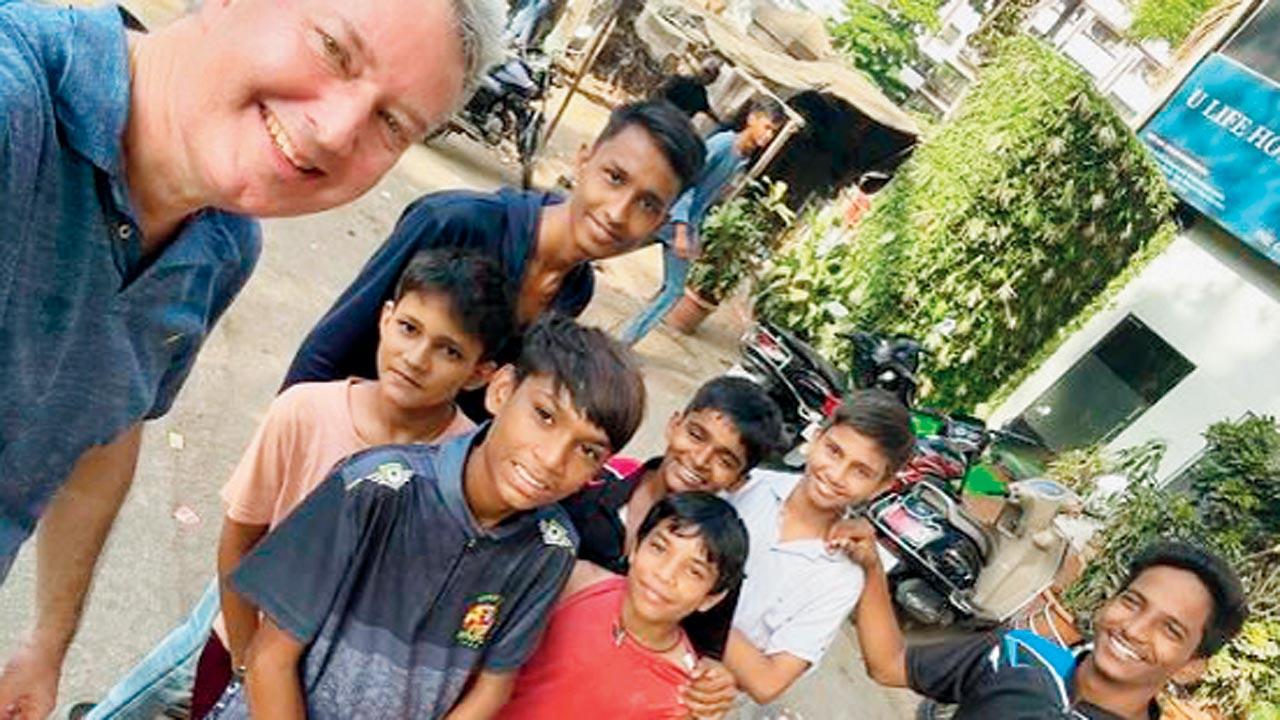 Festen poses with Rohit (centre) and his friends during his visit to Marol