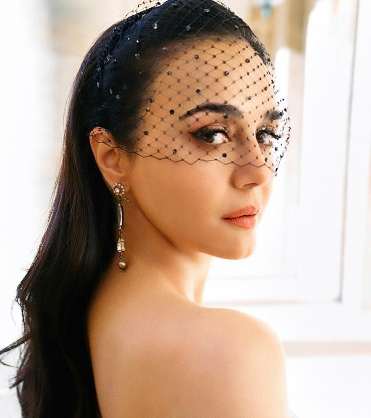 She also shared a photo on Instagram on Monday, where she wore a black fascinator paired with a white and silver gown, giving her an old-world glamorous look.