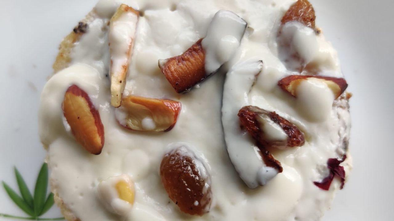 Bread RasmalaiIngredients:Whole wheat bread slices - 4Chopped mixed dry fruits fried in ghee - 100 gm Probiotic thick curd - 250 gmHoney - 4 tbspRose petals - a pinchSaffron strands - a pinch Cardamom powder - a pinch Ghee - 1 tbsp
Method:Start by shaping the bread with a tumbler in a round shape. Roast the round-shaped bread slices on a tawa with very little ghee until light brown, on both sides. 
Mix the roasted nuts with the blended curd and honey. Also, add in cardamom powder rose petals, and saffron strands.
On a wide plate, spread half the prepared curd. Gently place the roasted bread slices.
Pour the remaining curd mix on the bread covering it all well. Sprinkle some roasted nuts and some more saffron strands and rose petals.
Refrigerate them for about 15 minutes. Serve chilled.
Recipe by Shilpa Kumar, in-house organic recipe curator, Akshayakalpa Organic 