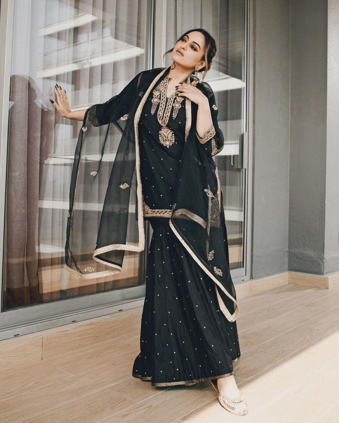 Sonakshi Sinha aces her look. The actress opted for a black suit paired with a matching skirt and sheer dupatta