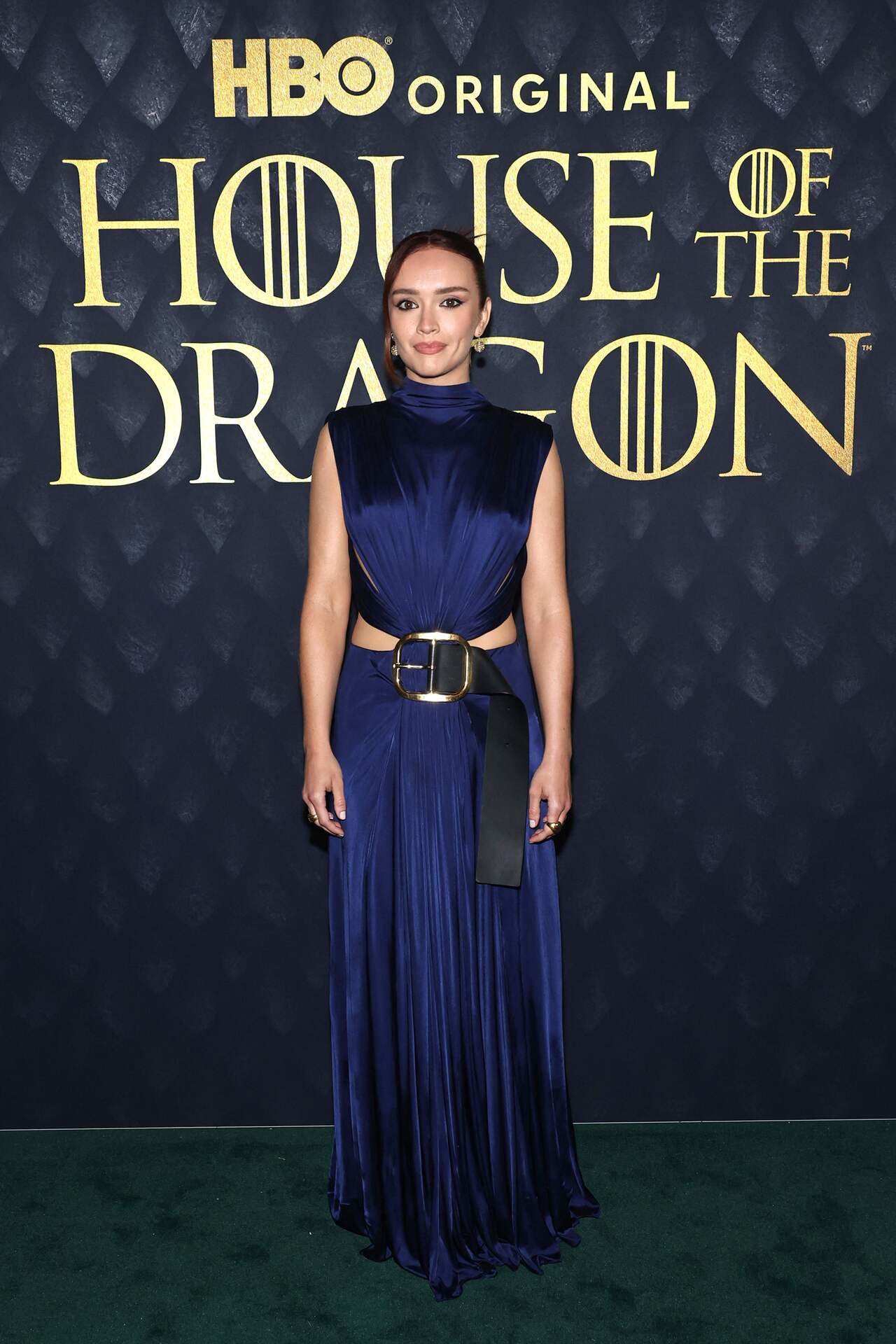 Olivia Cooke wore a royal blue satin cut-out gown, making heads turn with her fashionable display. She went for a full glam look with a messy hairdo. 