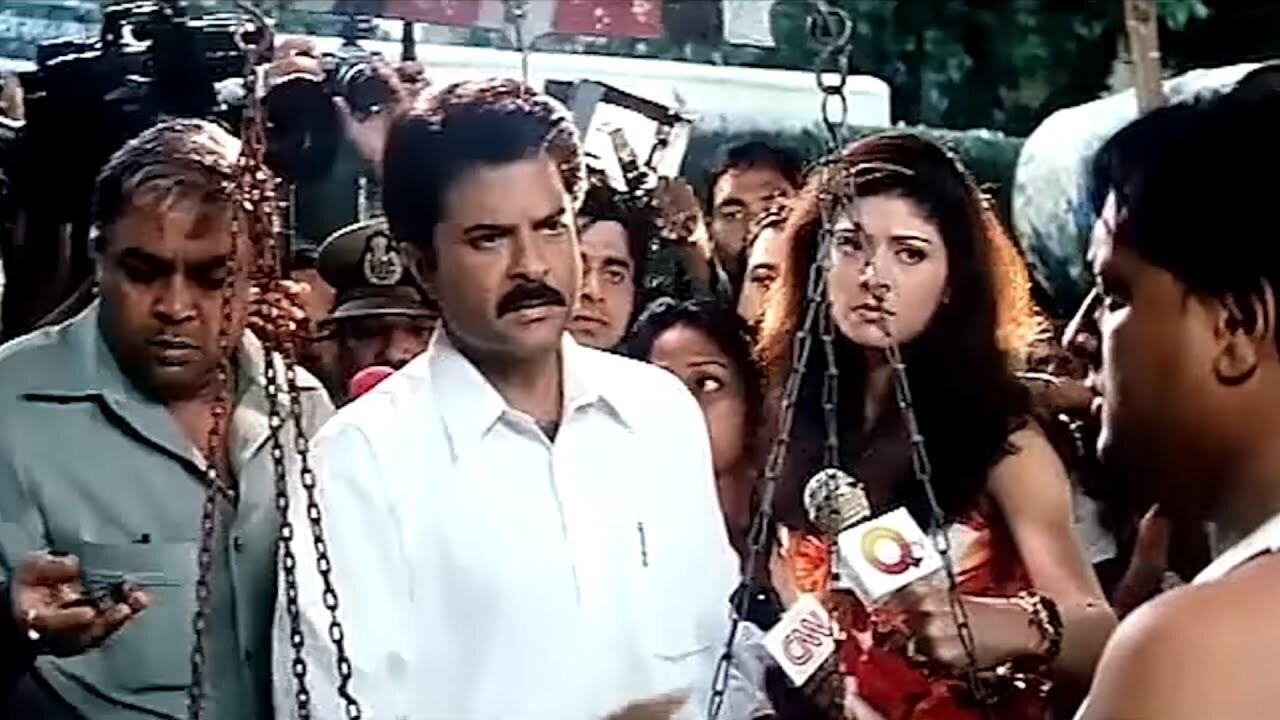 Nayak: The Real Hero (2001): 
After the chief minister challenges Shivaji Rao to run the state for a day, he accepts and strives hard to put an end to corruption. Due to his success, people force him to join politics. Directed by S Shankar and starring Anil Kapoor, Paresh Rawal, Amrish Puri and Rani Mukerji, this is one of the most impactful political dramas of Hindi cinema
 