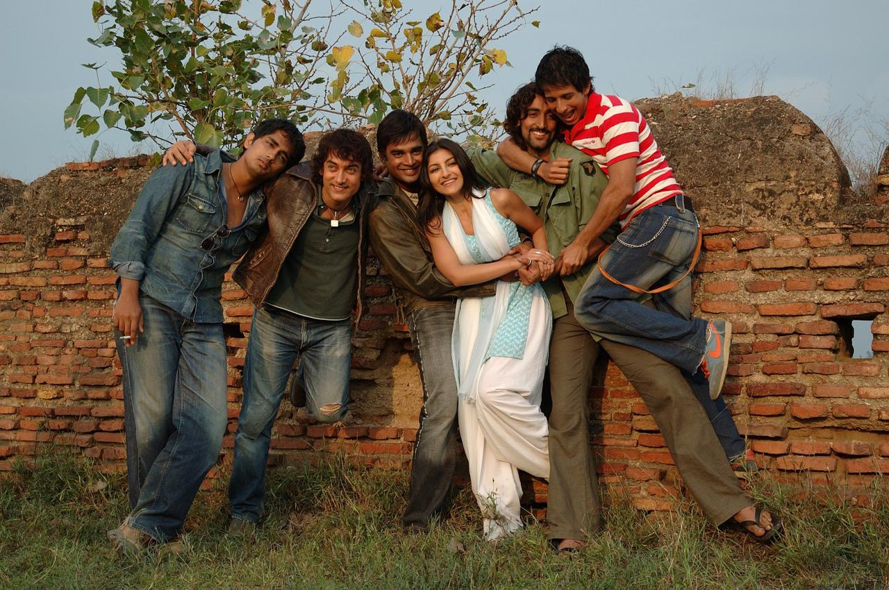 Rang De Basanti (2006): 
When Sue selects a few students to portray various Indian freedom fighters in her film, she unwittingly awakens their patriotism. The emotional and mental process turns them into rebels for a cause. Directed by Rakeysh Omprakash Mehra, the film stars Aamir Khan, Siddharth, R Madhavan, Soha Ali Khan, Sharman Joshi and others