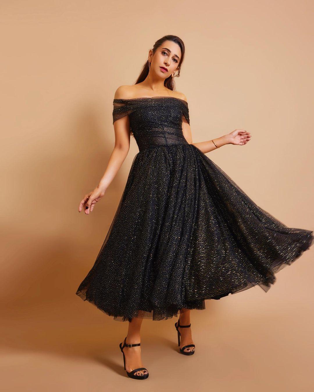 The black dress looked more stunning and otherworldly than ever.
