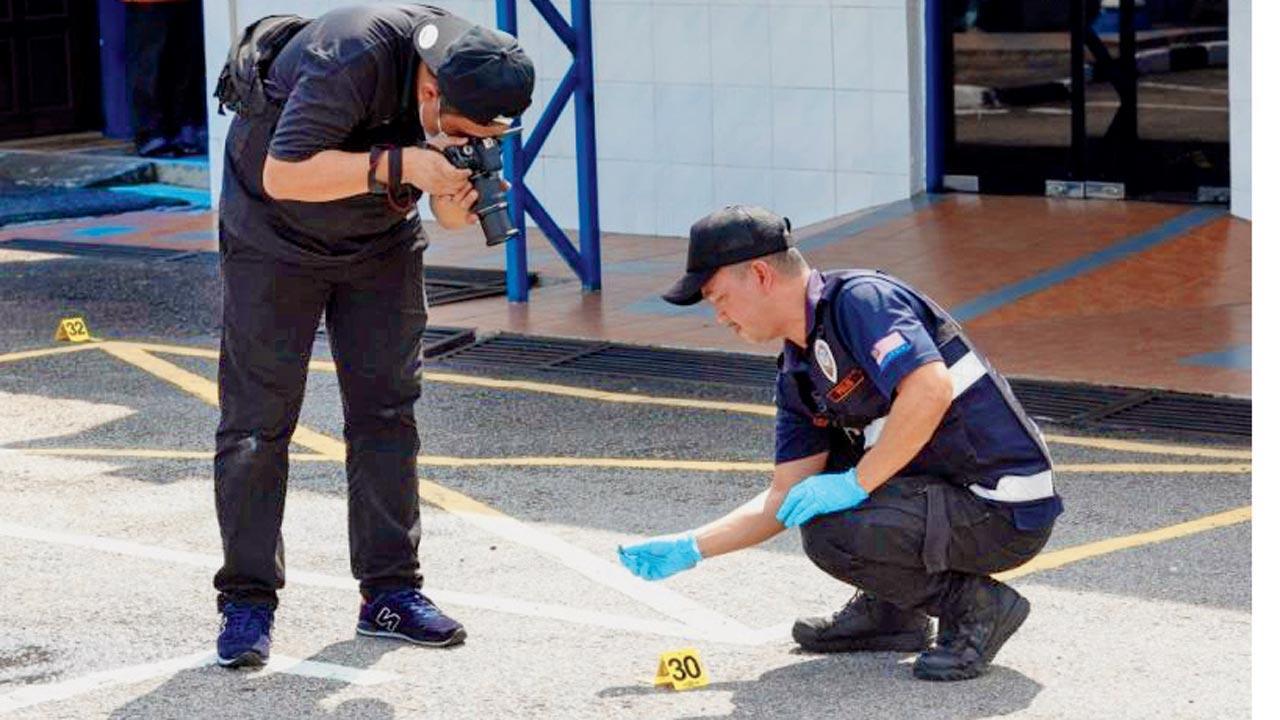 Kin of Malay cop attacker to face terror charges