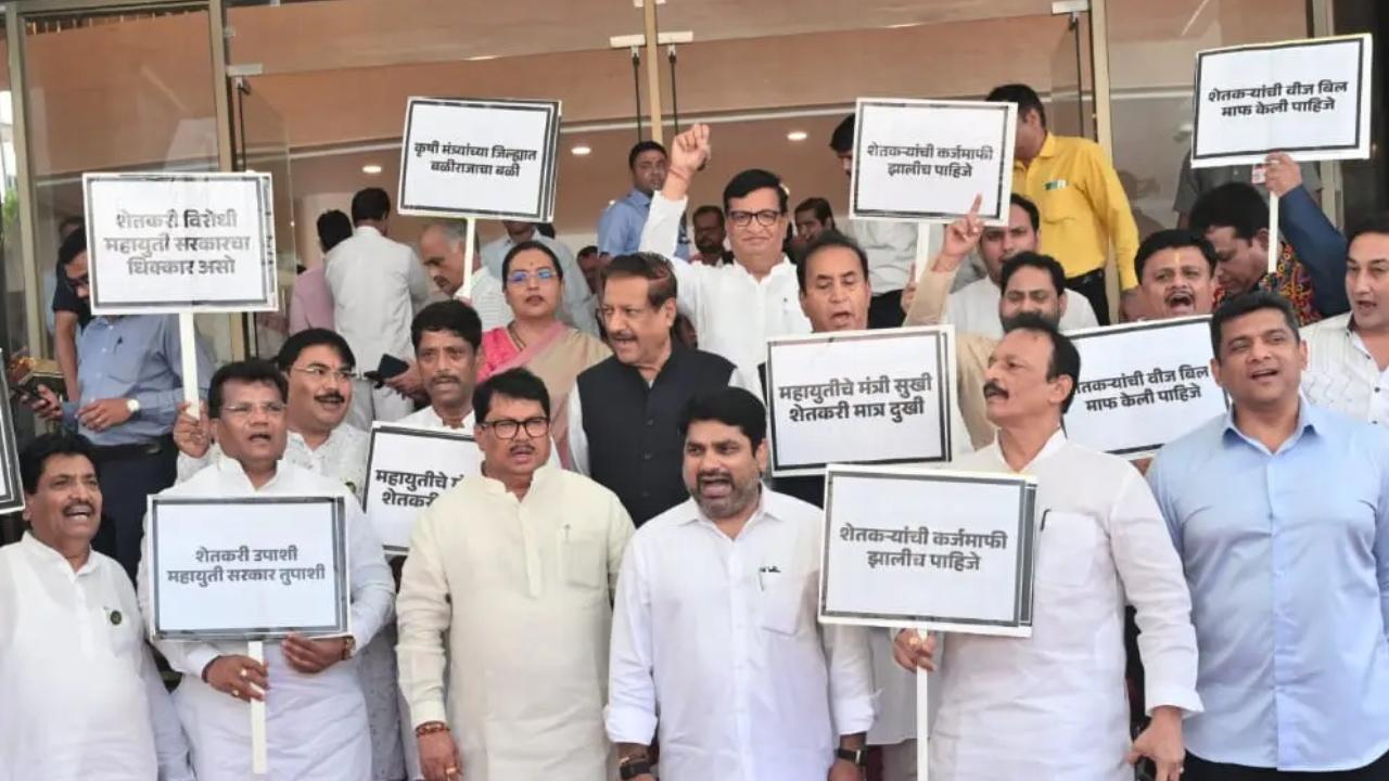 Opposition members staged a protest on the premises of the Maharashtra Vidhan Bhavan on day one of the monsoon session of the state legislature in Mumbai