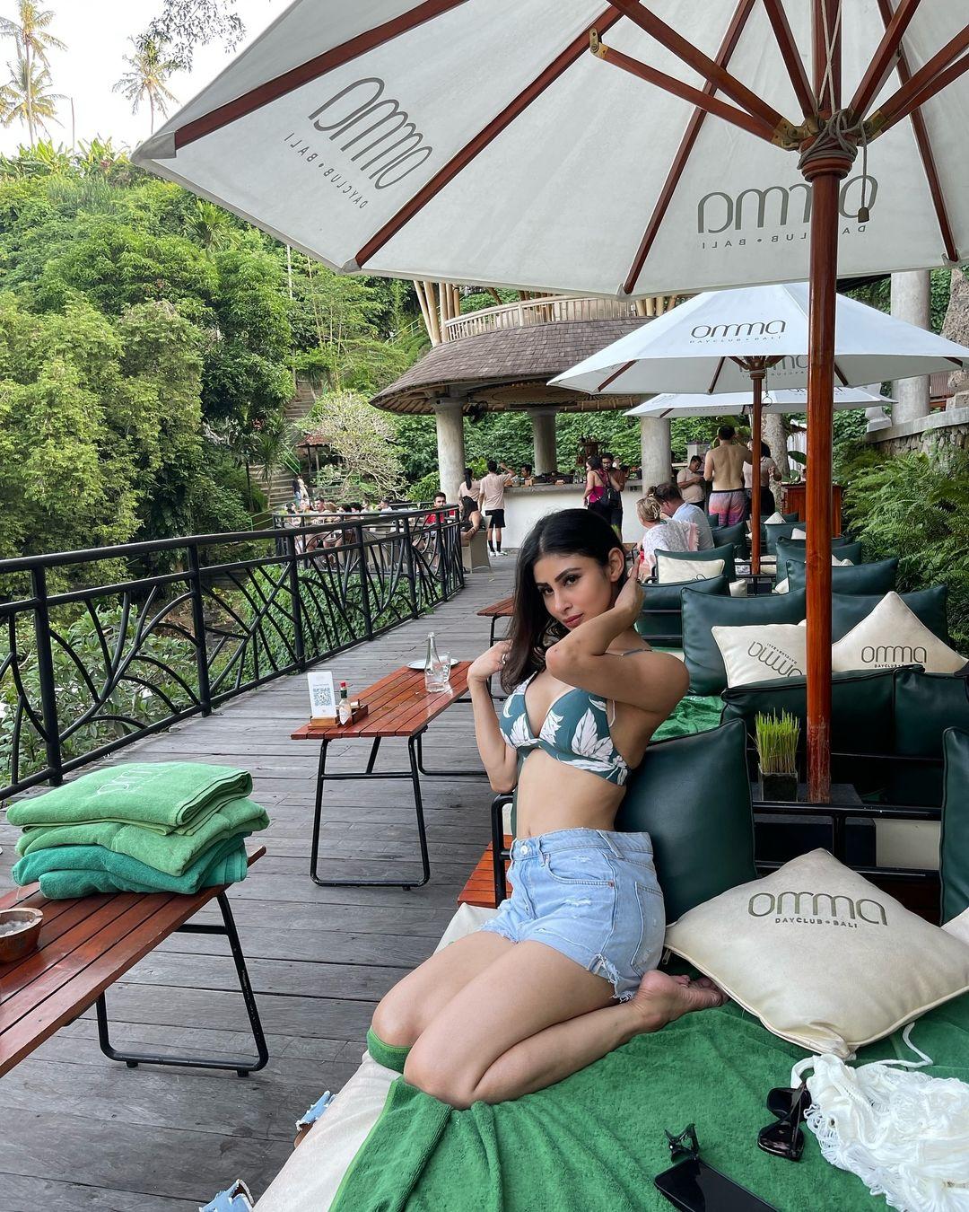 She looks her best in a printed swimsuit set.
