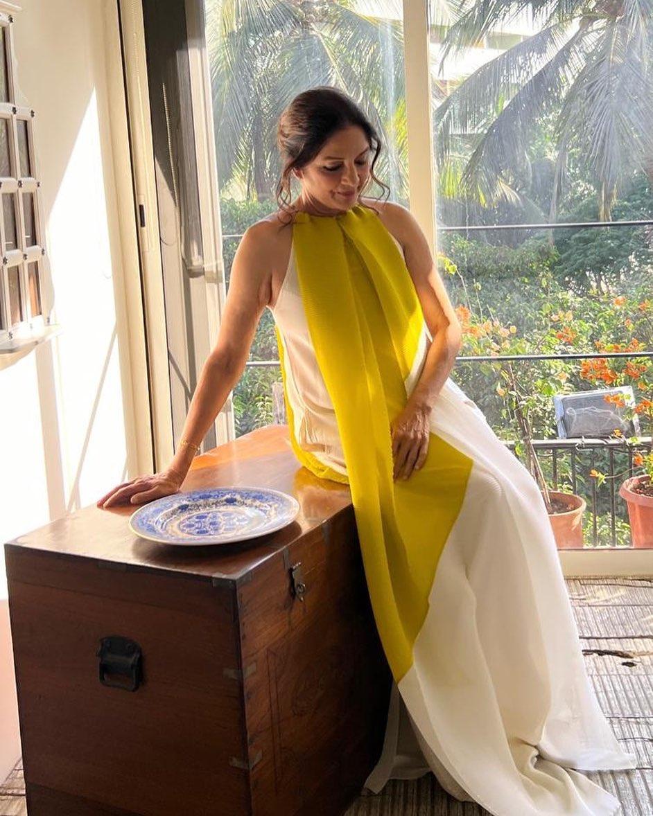 For an event in Mumbai, Neena chose this yellow and white dress perfect for the weather and amazing to look at!
