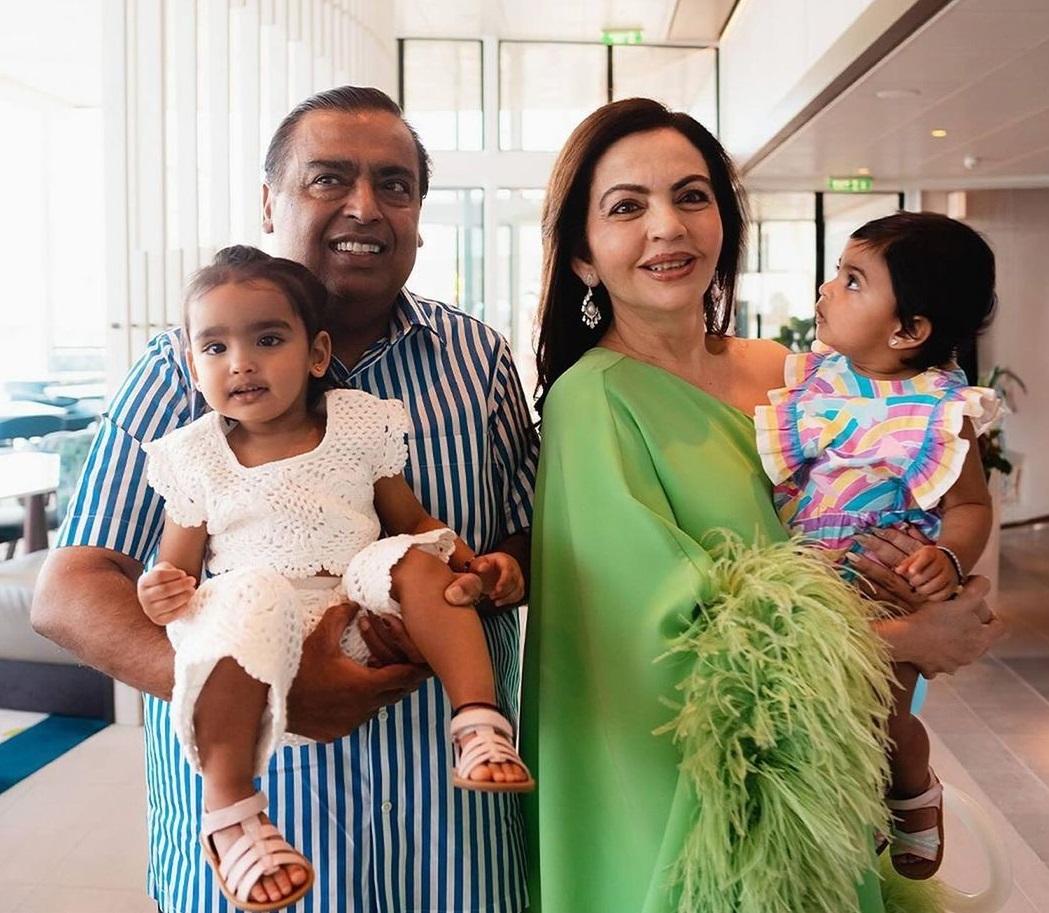 Nita and Mukesh Ambani share an adorable moment with Akash and Shloka's baby girl, Veda, for her first birthday bash.