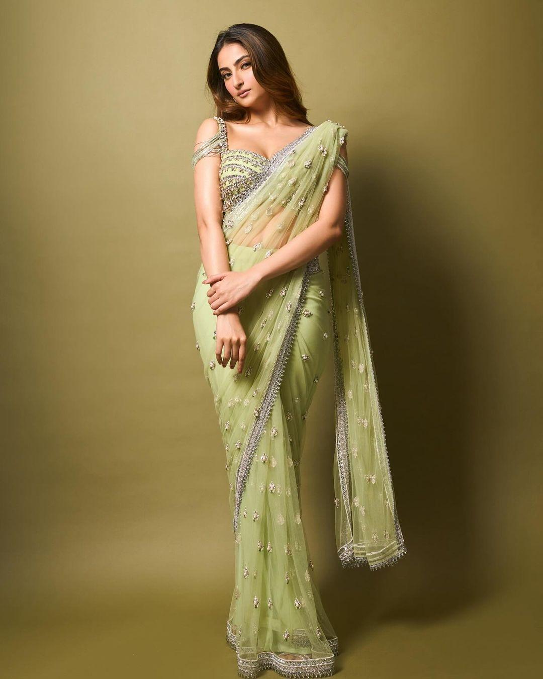 Palak Tiwari wore a muted lime green saree with beautiful pearl and sequin details, and shiny silver lace on the borders for a bit of sparkle.
