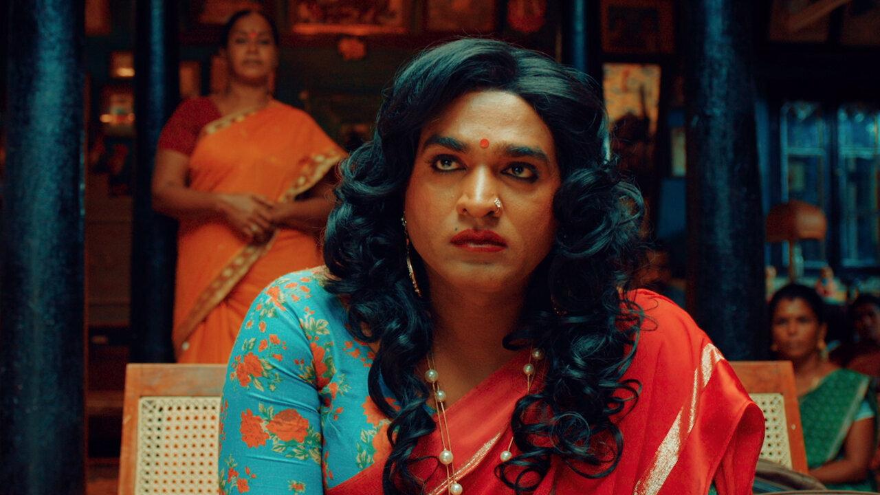 Super Deluxe 
'Super Deluxe' is a tale of four compelling stories in which the protagonists' belief systems are challenged. In one of the segmets, Vijay Sethupathi plays a transgender woman named Shilpa who has returned to the family she had abandoned. The film explores the challenges posed by trans people and how society's conditioning leads to humiliation and isolation from the society. On the contrast, we see Shilpa's son Rasukutty being unbother by the gender of  his father as he is yet untouched by the conditioning of the society. 
