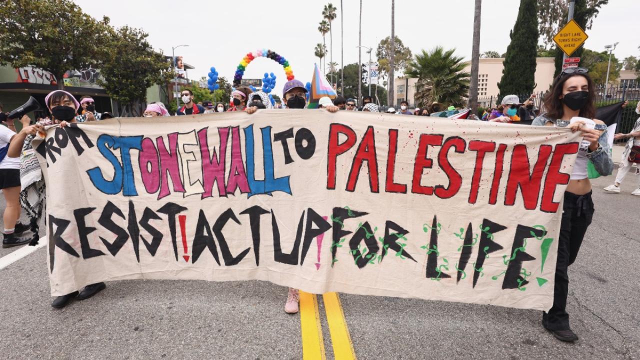 The LA Pride Parade also demonstrated solidarity with Palestine by featuring signs and speeches that condemned Israel's war in Gaza (Photo by Tommaso Boddi/Getty Images/AFP)