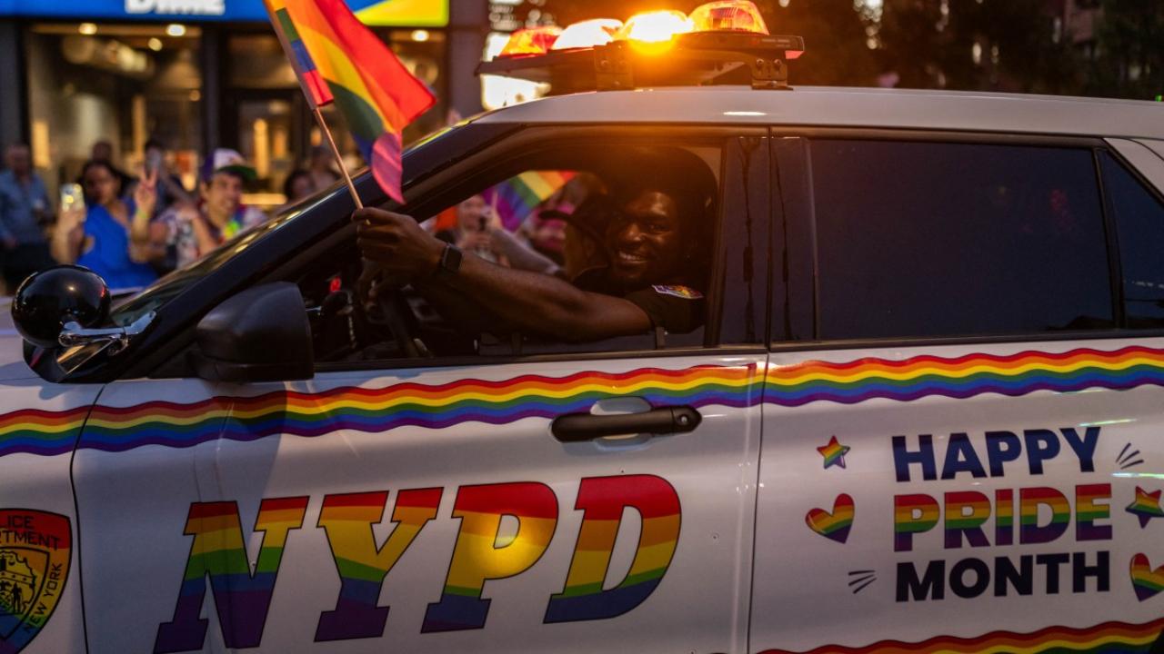NYPD officers take part in the Brooklyn Pride Parade in Brooklyn, New York, on June 8, 2024 (Photo by Adam GRAY/AFP)