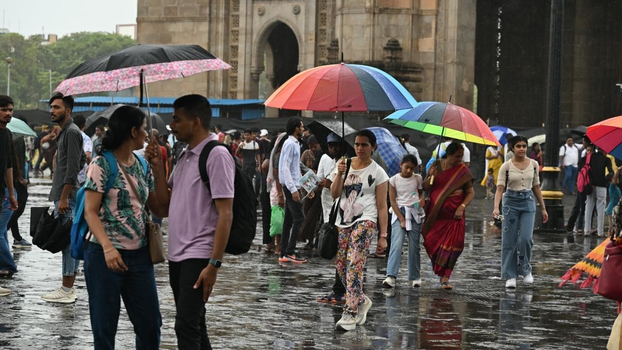 The iconic Gateway of India transformed into a lively hub where locals gathered to embrace the rainy season on Friday