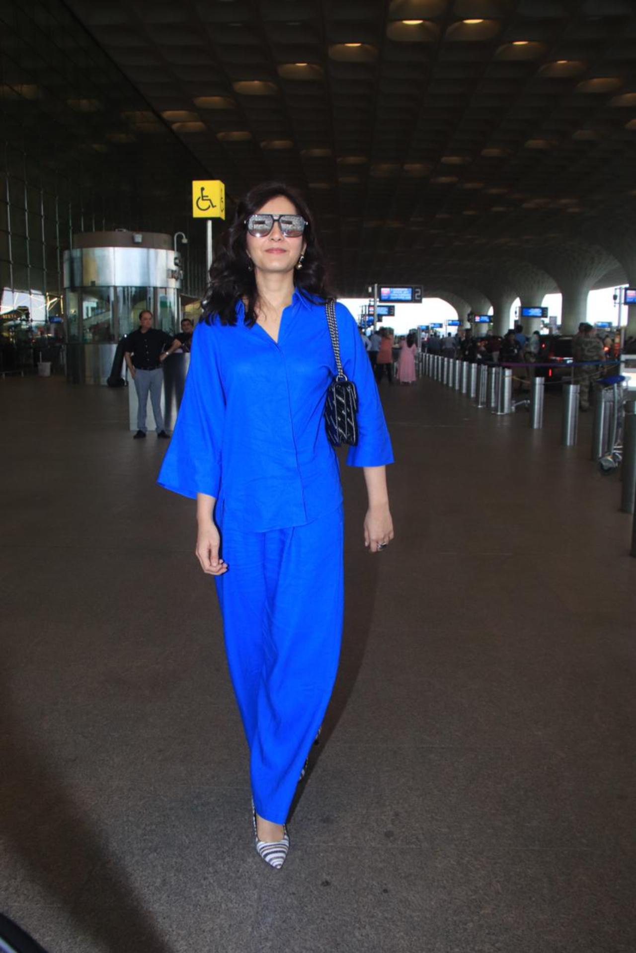 Raashii Khanna was spotted at the airport on Friday evening in a bright blue dress beating the gloomy Mumbai monsoon weather