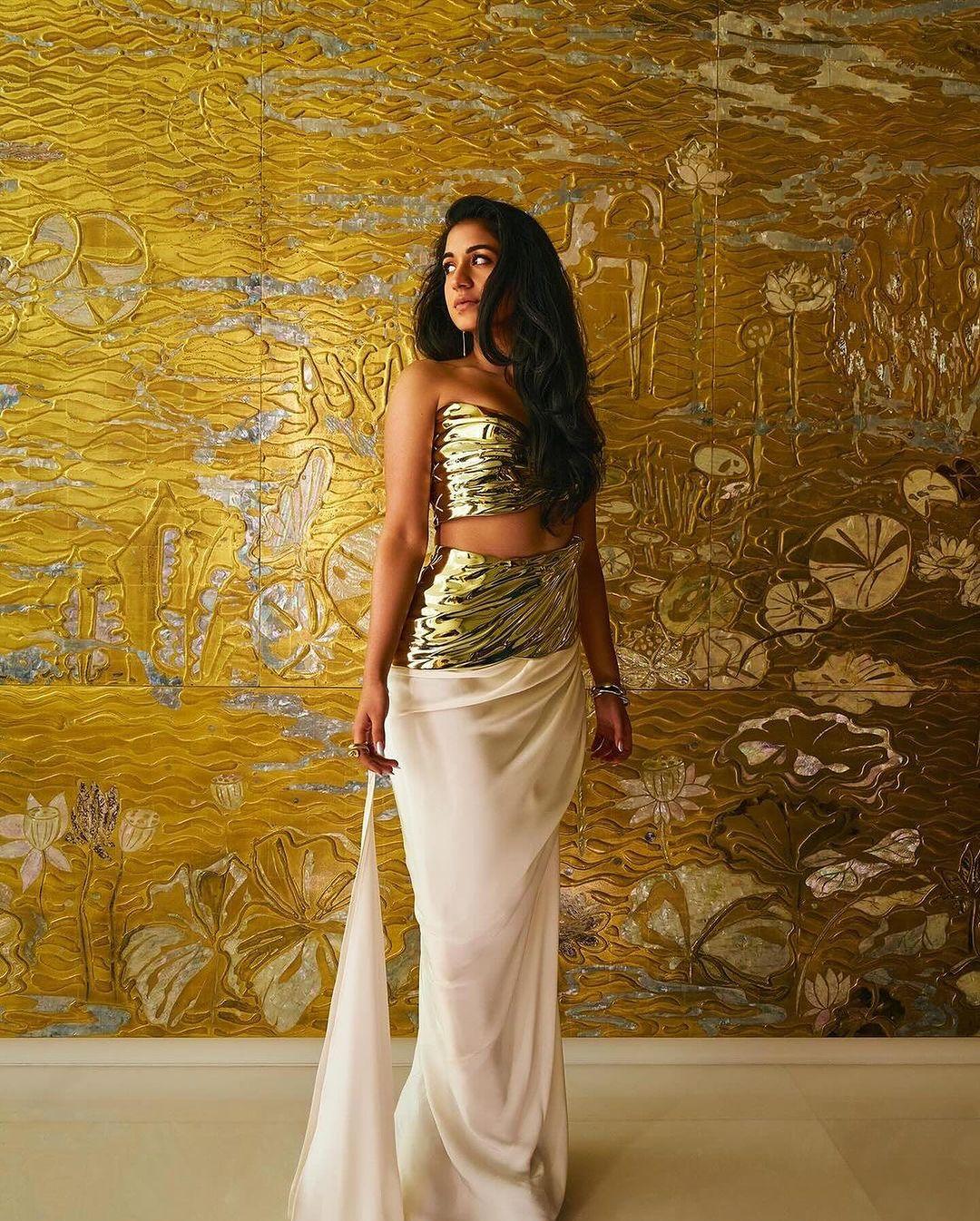 Radhika Merchant embraced technology for her outfit for the Toga-theme party. 