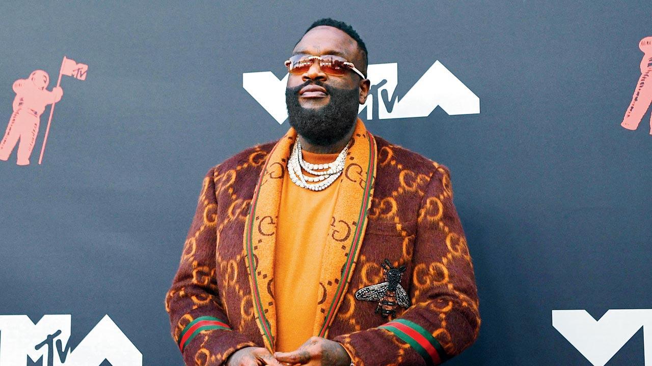 Rick Ross to auction rare sneakers, piano with Michael Jackson’s Thriller art