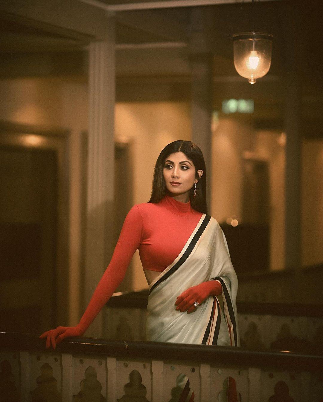 Shilpa Shetty looked amazing in a white saree with black borders.