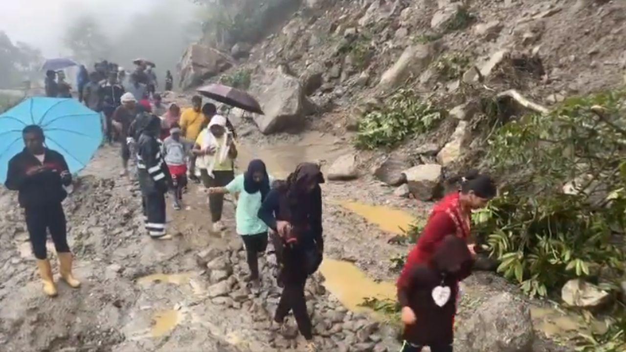 Due to the blockage of various roads at several locations, around 1,200 tourists got stranded in Lachung town, officials said.