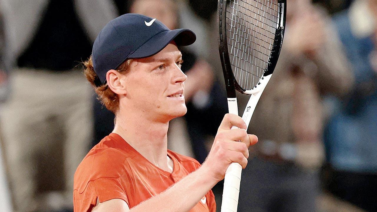 Italy’s Jannik Sinner celebrates his victory over Corentin Moutet of France in Paris yesterday 