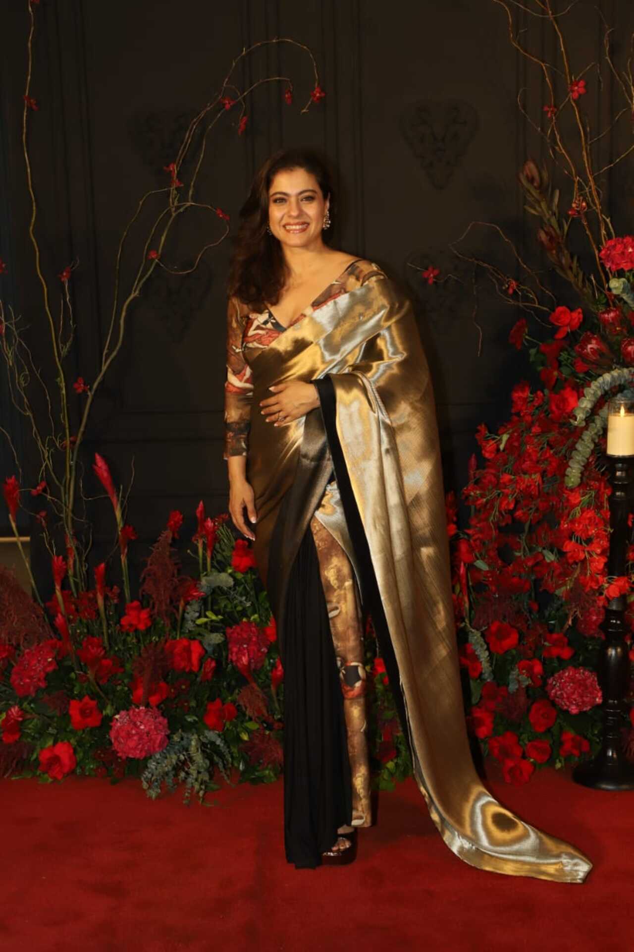 Kajol looked stunning in a golden and black saree, keeping up the elegant quotient as always. 