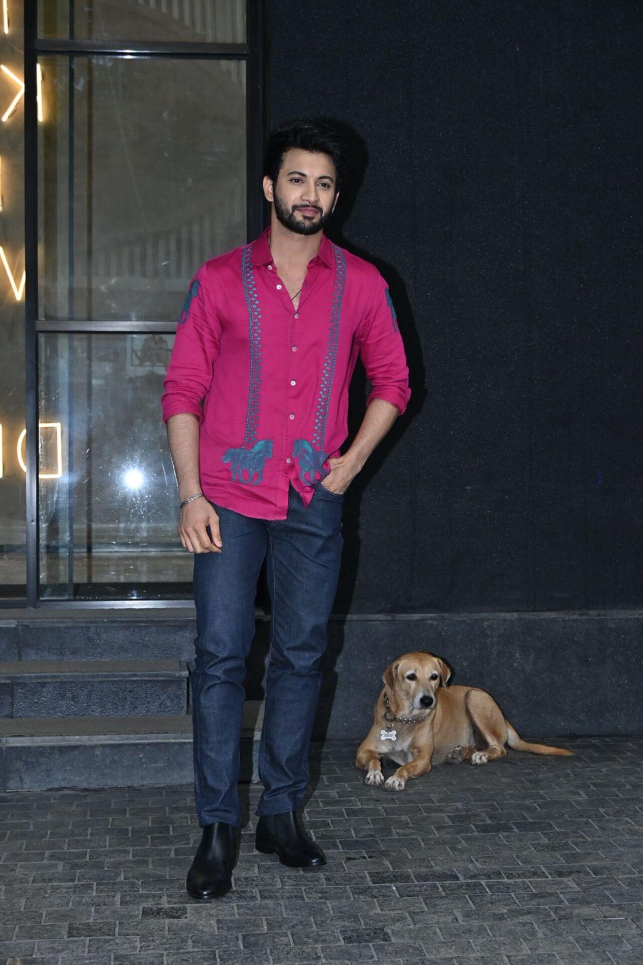 Rohit Saraf was seen in a quirky crimson shirt and grey trousers. 