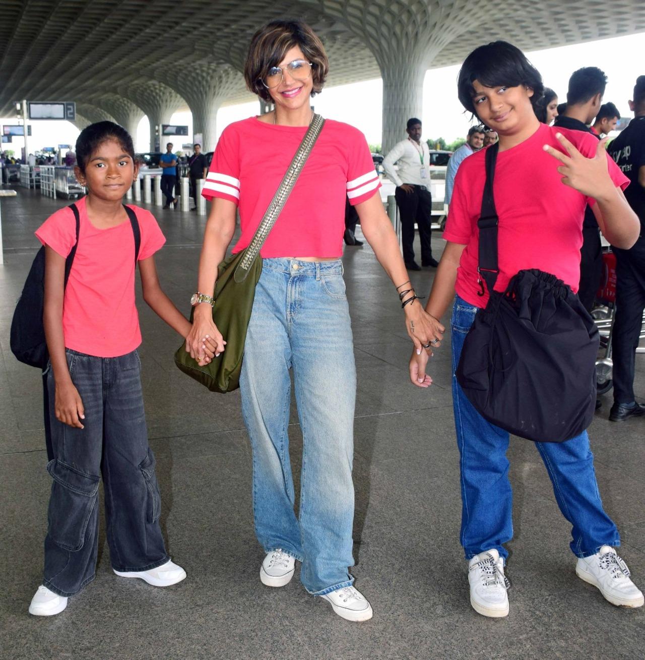 Mandira Bedi with her kids at the airport