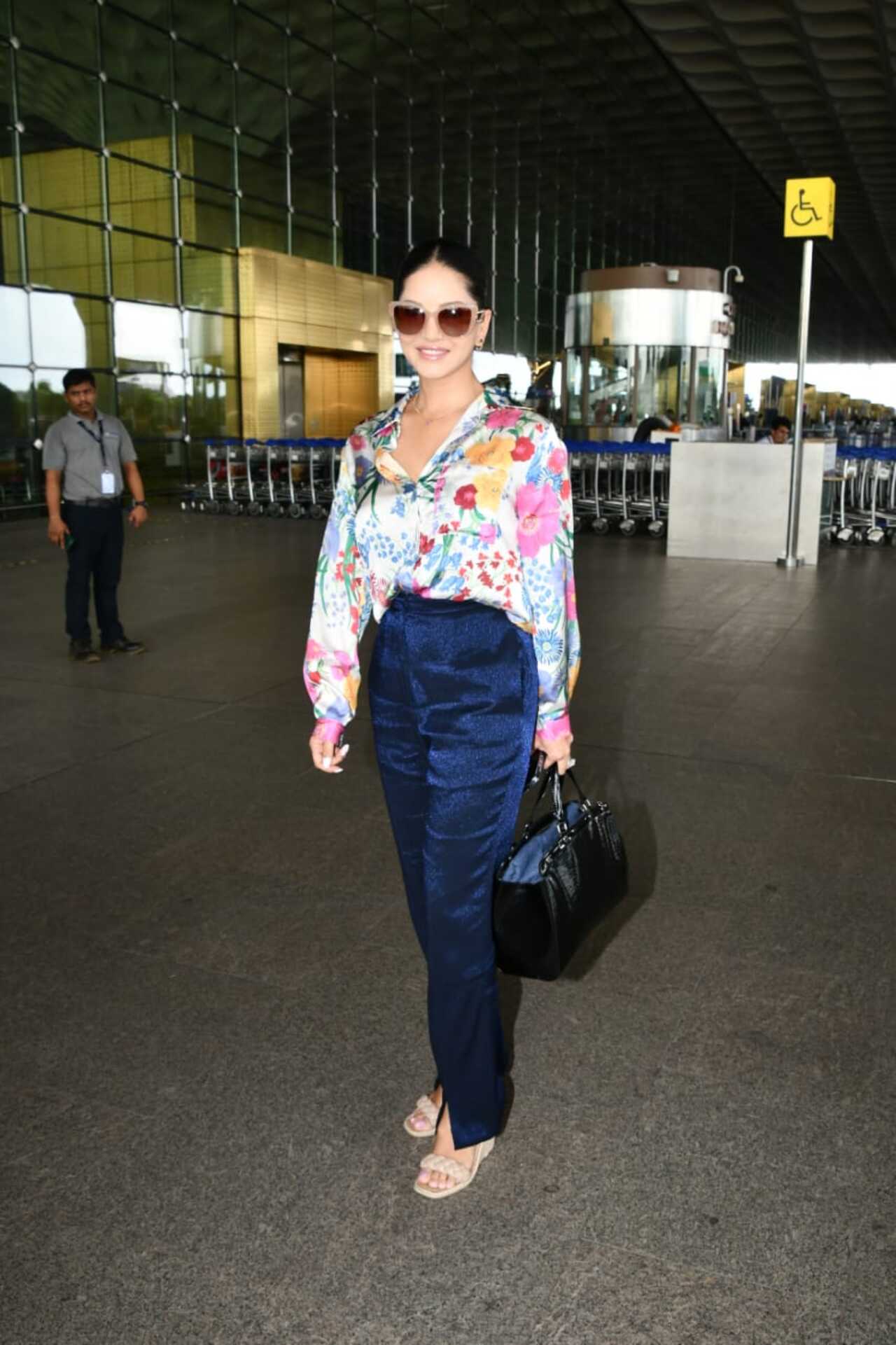 Sunny Leone sported casual attire at the Mumbai airport as she jetted off to fulfill professional commitments. 