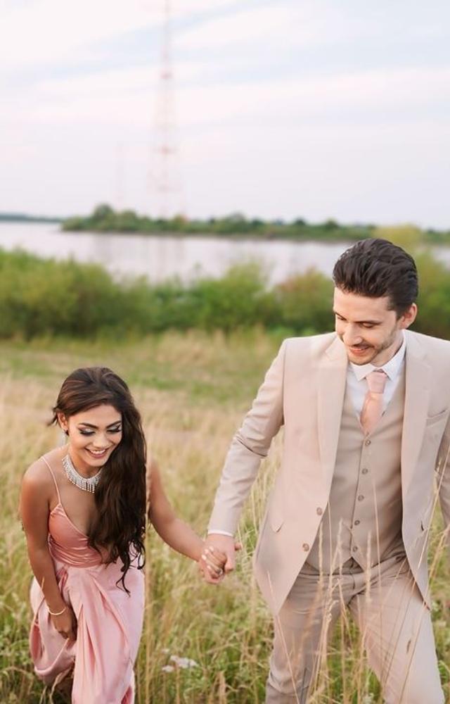 Sreejita wore a pastel pink-hued satin slip dress for her special day. She chose a half-tied hairstyle with loose wavy curls. 
